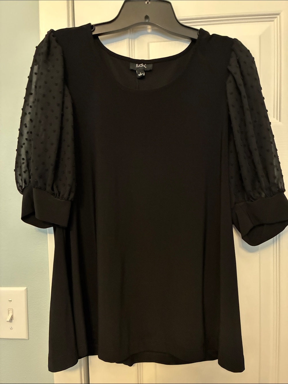 Black scoop neck blouse with puff sleeves